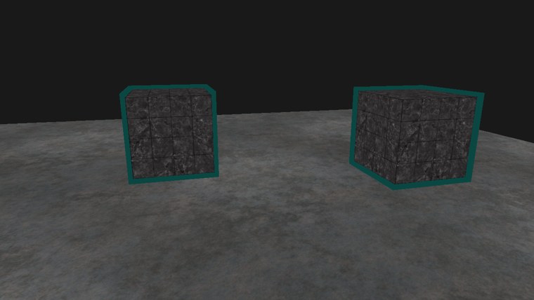 The two marble cubes on the metal floor, each with a dark teal outline around it